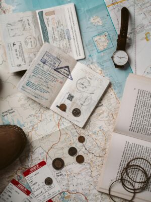 Explore wanderlust with flatlay of passport, map, and travel essentials.